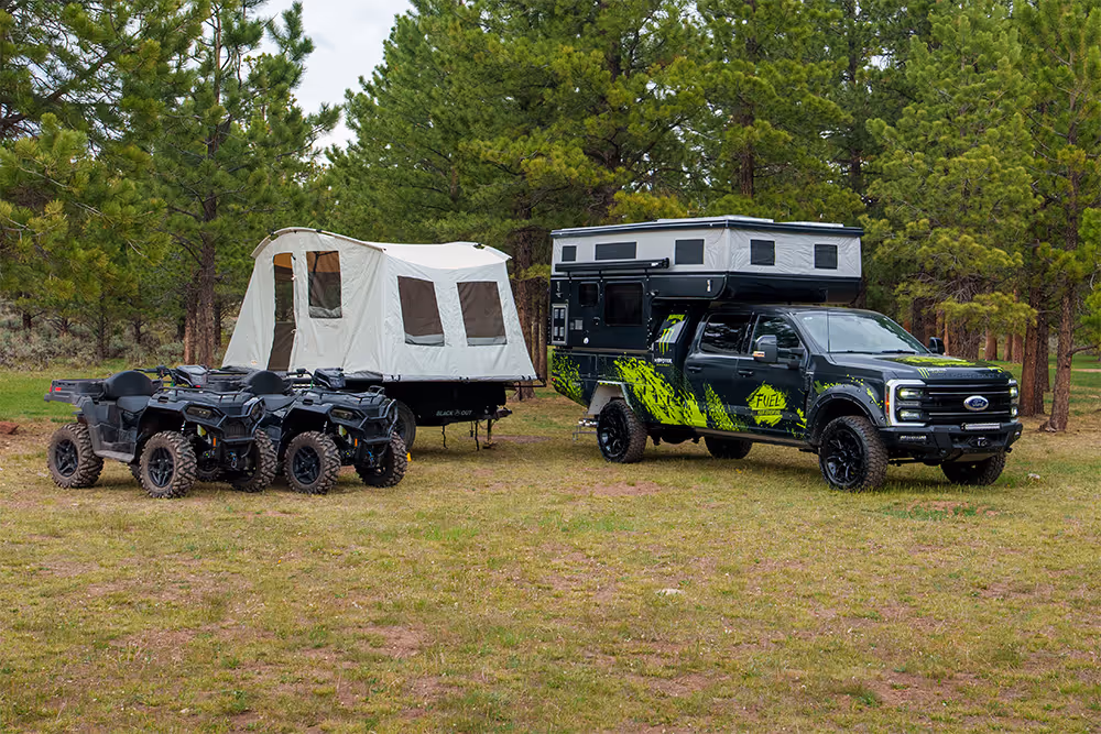 Ford F-250 with a custom camper, two ATVs and a trailer, plus $30,000
